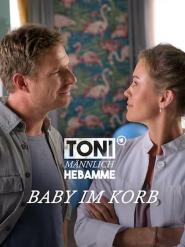 Toni, männlich, Hebamme: Baby im Korb